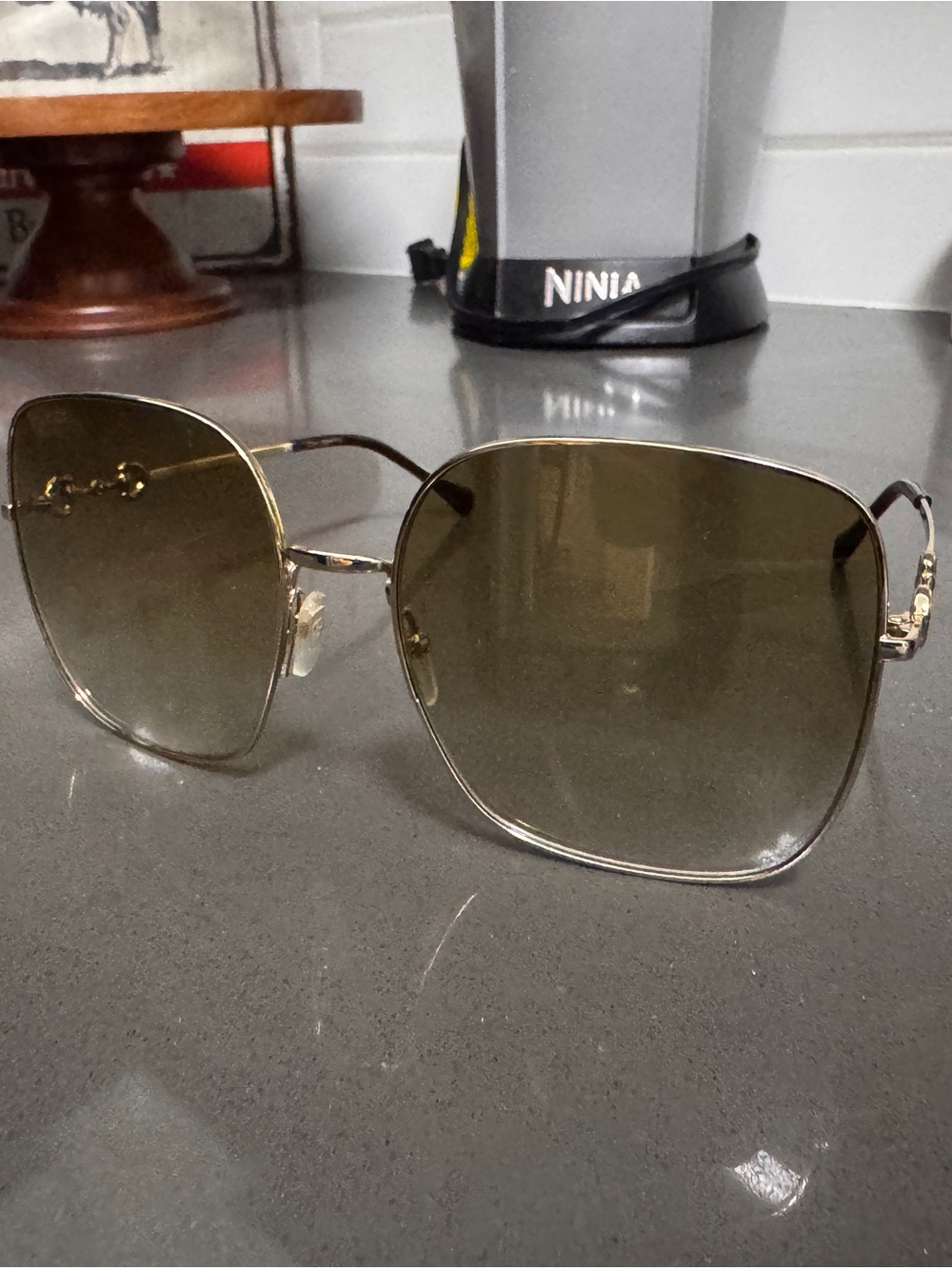 Gucci GG0879S Gold Frame Sunglasses with Yellow-Tinted Lenses - Picture 5 of 14